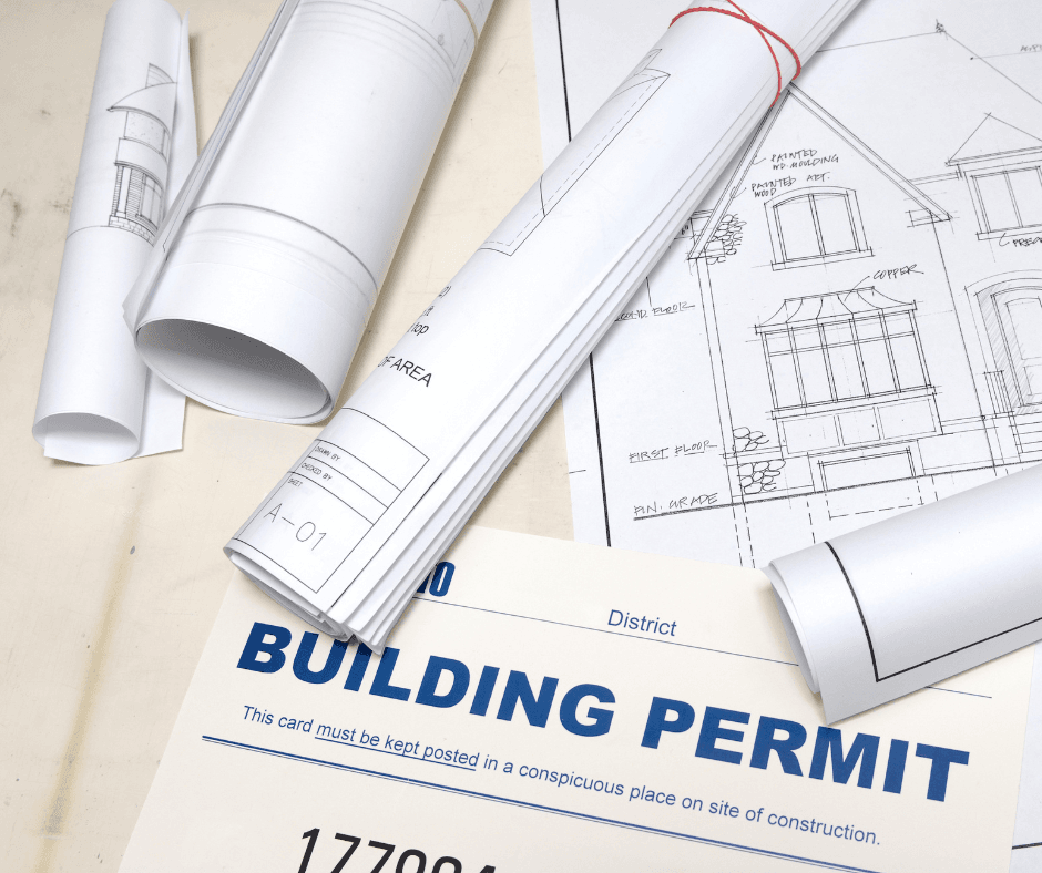 A building permit application. Includes blueprints and information about the permit.